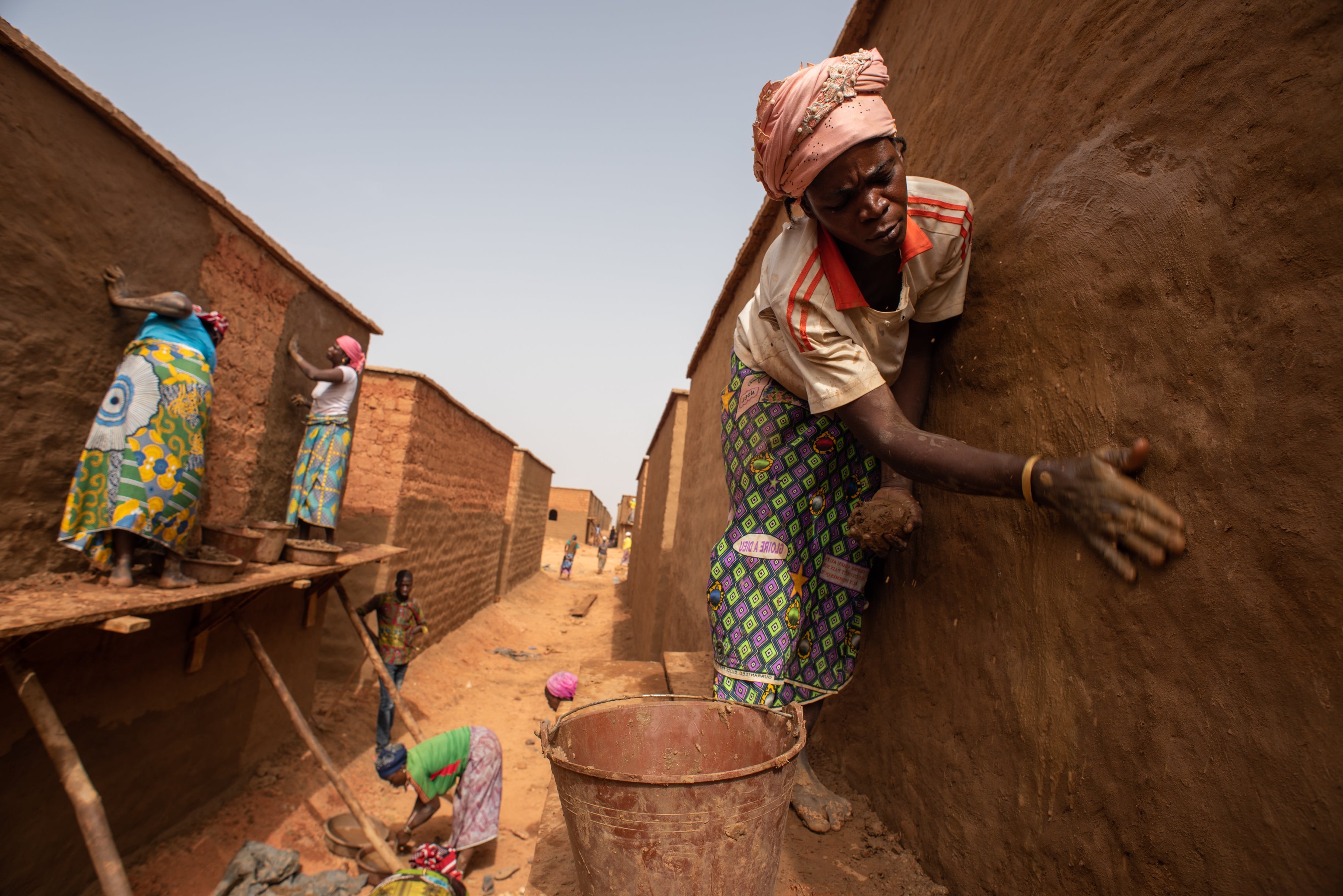Internally Displaced and locals learn to build eco-friendly homes for themselves in Burkina Faso.