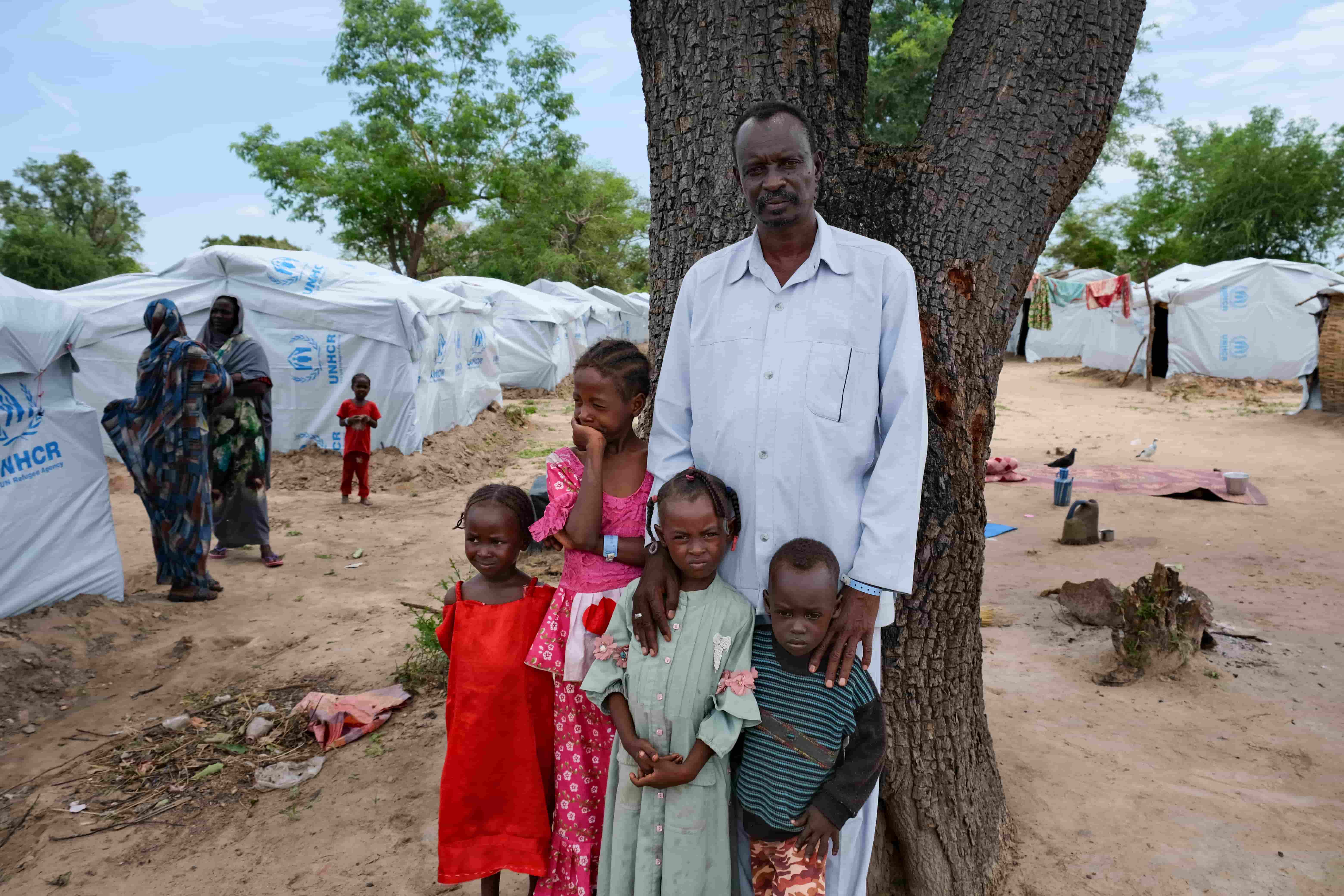 Mohammed, who fled the violence in Sudan, with four of his children at a camp in Central African Republic