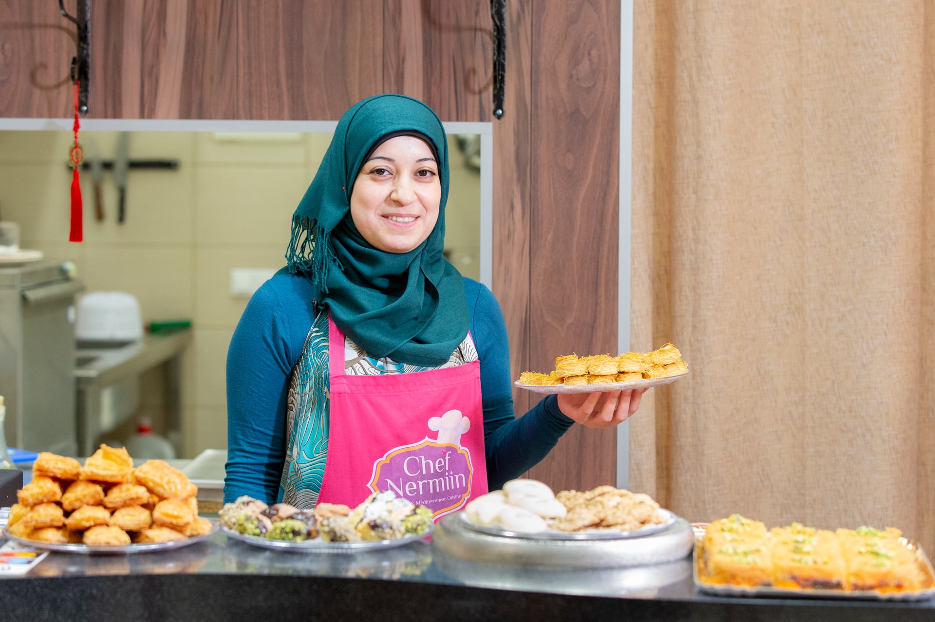 Nermiin with her delicious homemade pastries