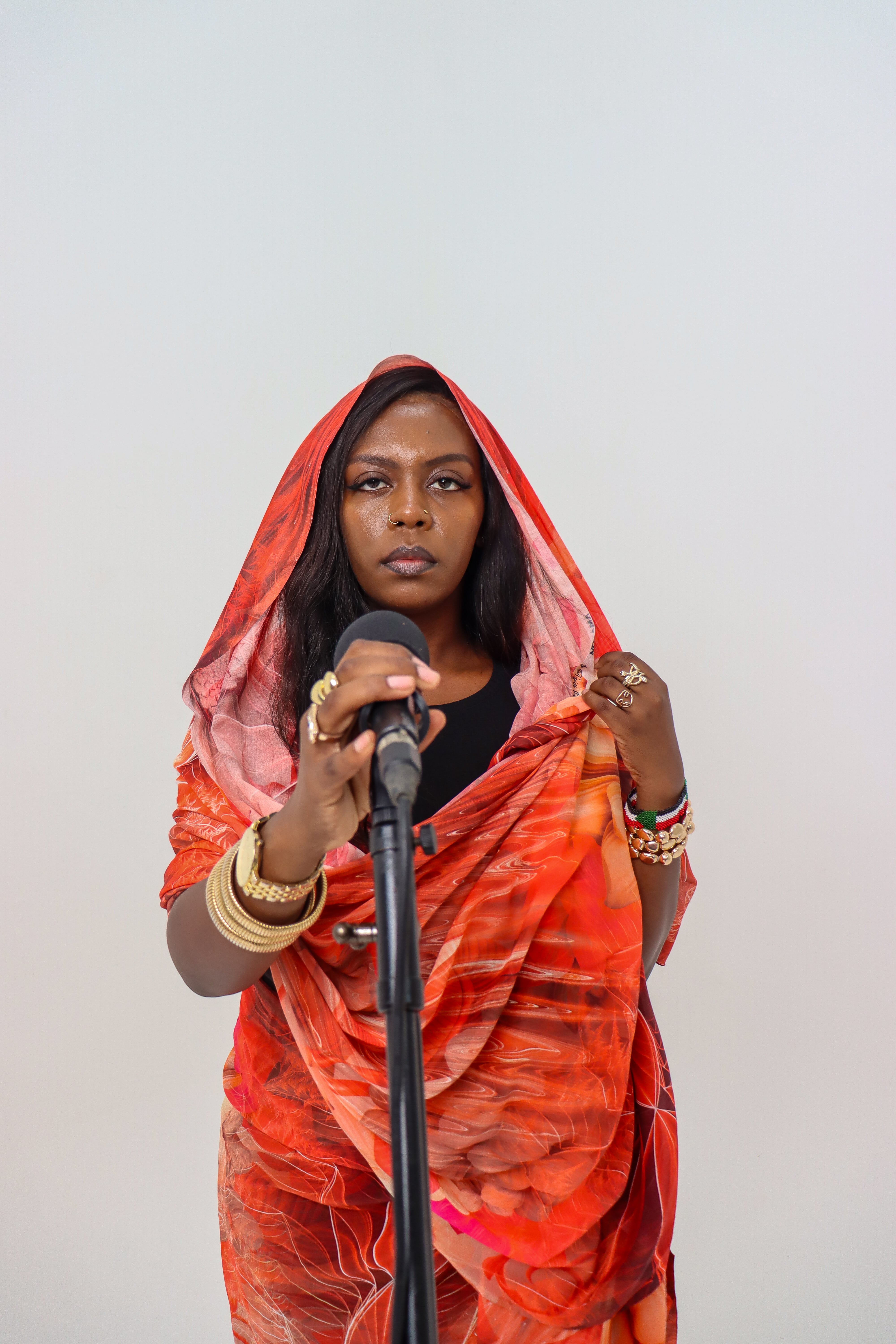 Huda the Goddess, the winner of the 2025 Les Murray Award, performs spoken word poetry. Huda is a former Sudanese refugee.