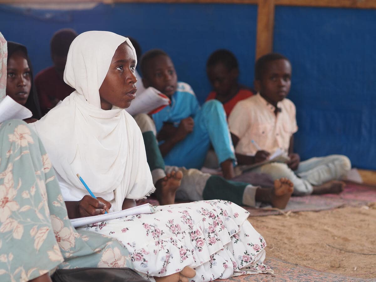 Isra attends primary school and studies to be a doctor. 