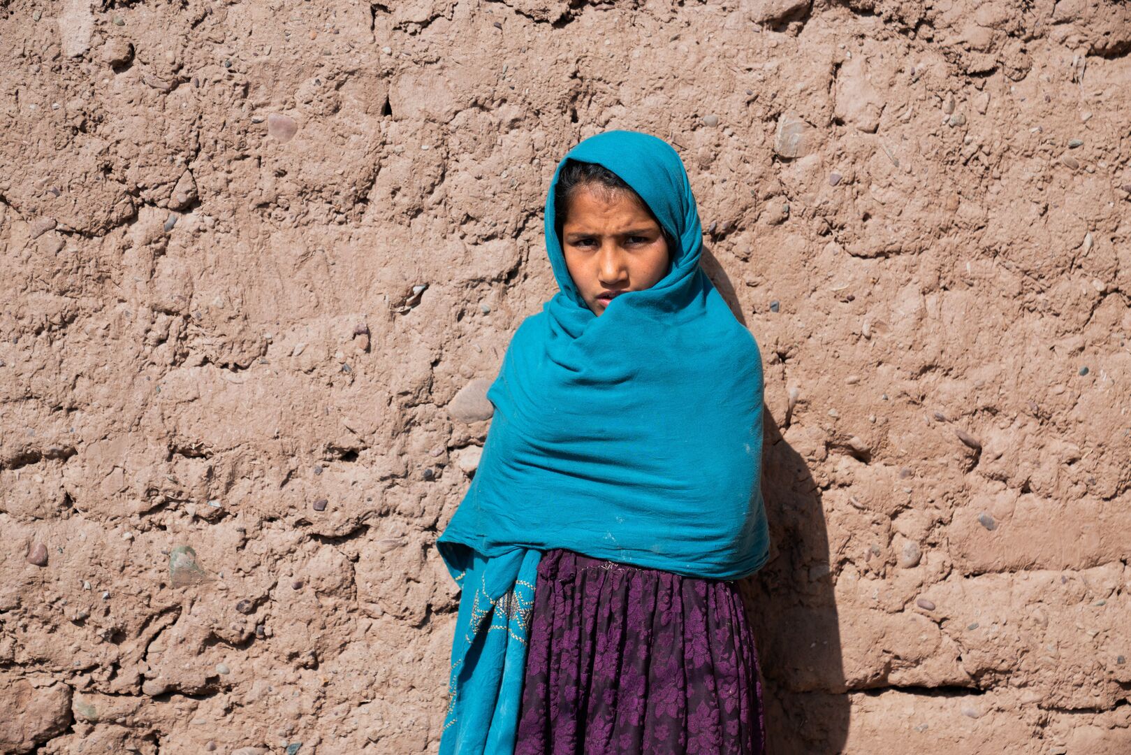 Sadaf, 10, is an internally displaced girl from Faryab province, now living in a damaged house in Herat after the recent earthquakes.
