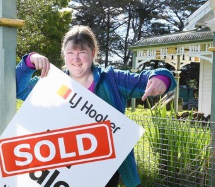 Fiona Wallace With Sold Sign