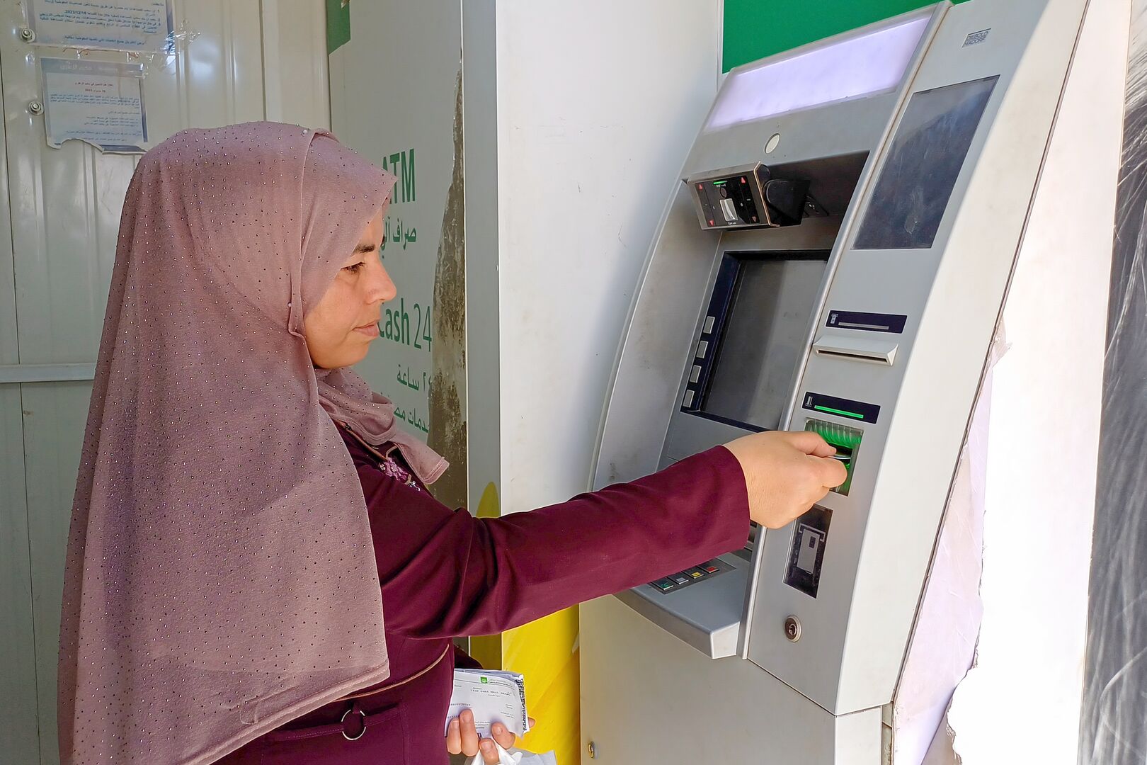 In a collaboration between UNHCR and Cairo Amman Bank, the first ATM was installed in the Zaatari camp to allow refugees to withdraw their financial assistance more easily.
