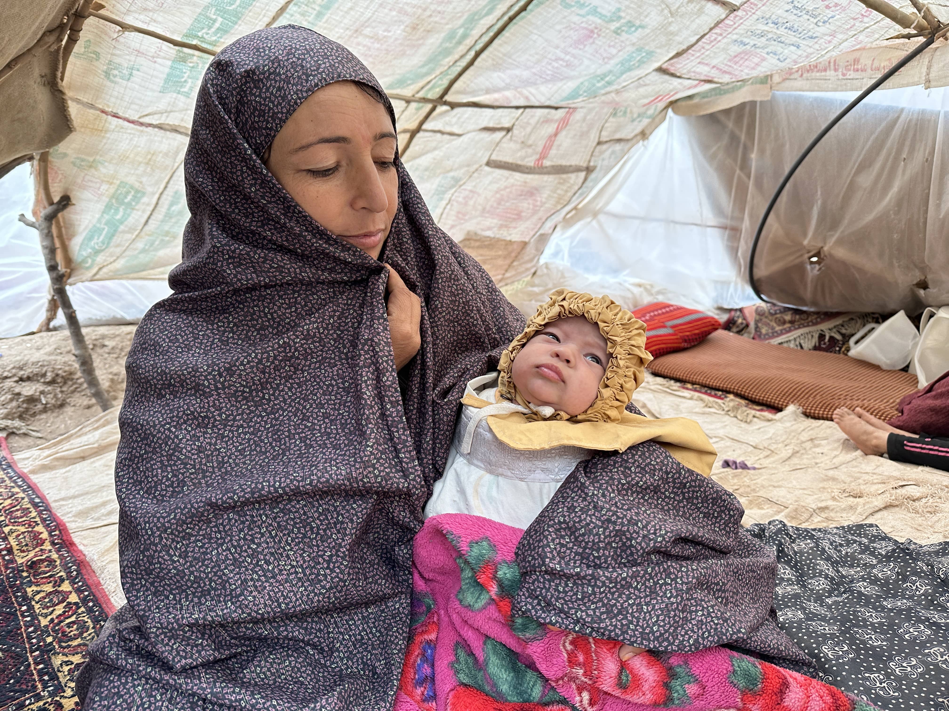 Humaira, a mother of eight, received a tent and emergency items from UNHCR and partners