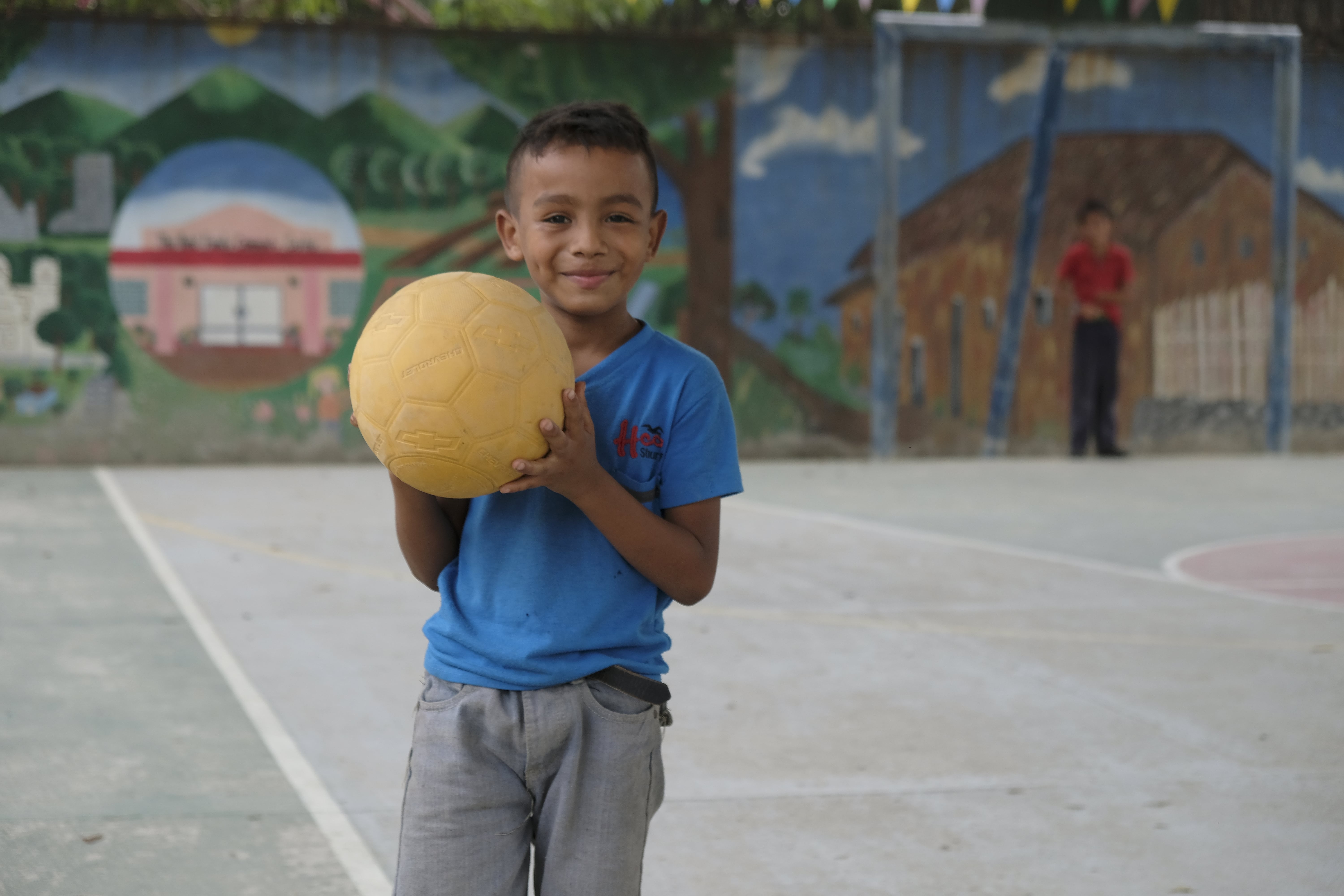 A child plays at a community youth centre for at-risk and displaced families supported by UNHCR in San Pedro Sula, Honduras. By the end of 2018, over 17,500 unaccompanied children had fled from horrific violence across Northern Central America. 