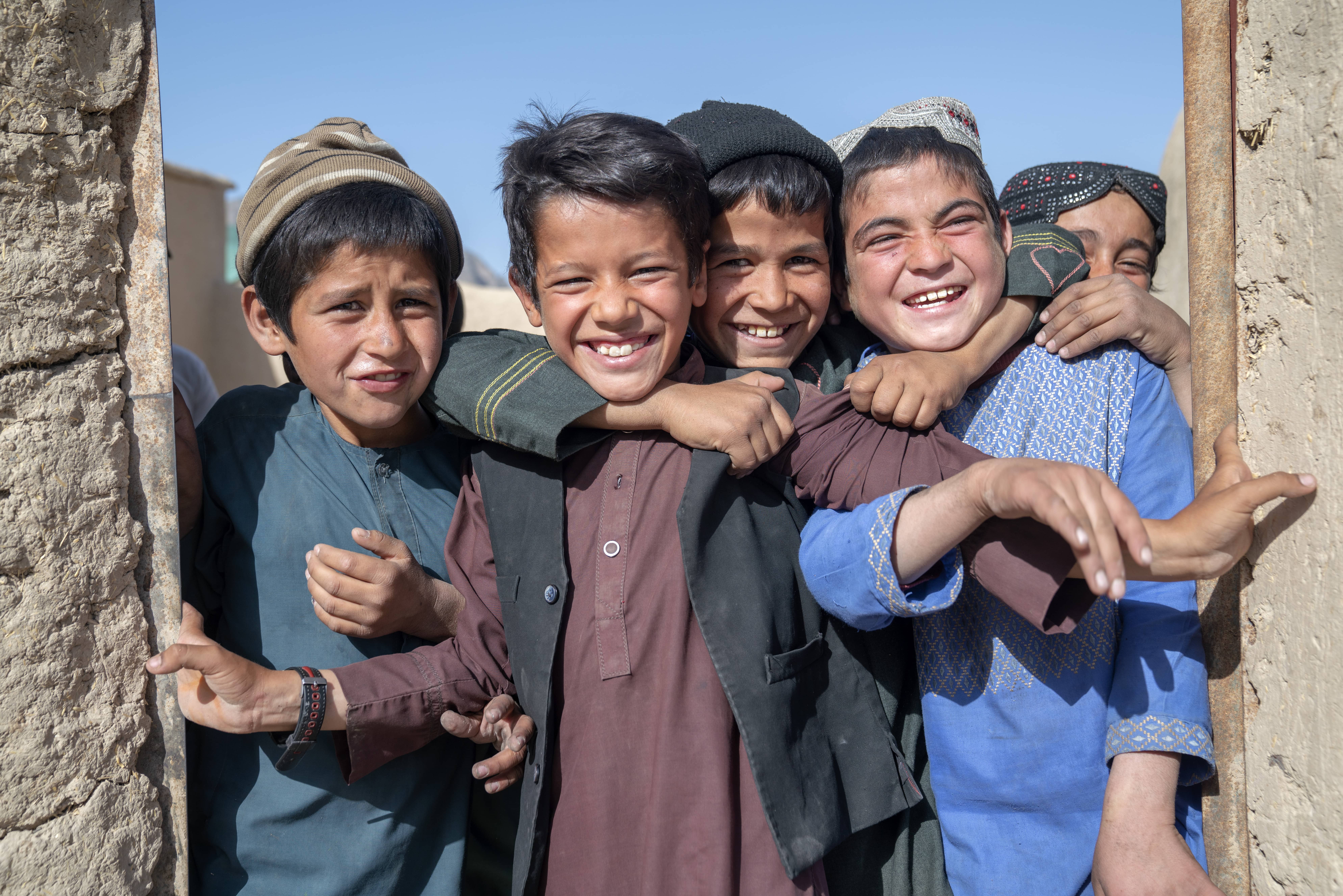 Children from internally displaced families play at a settlement for displaced people in Loya Wala north of Kandahar, Afghanistan.